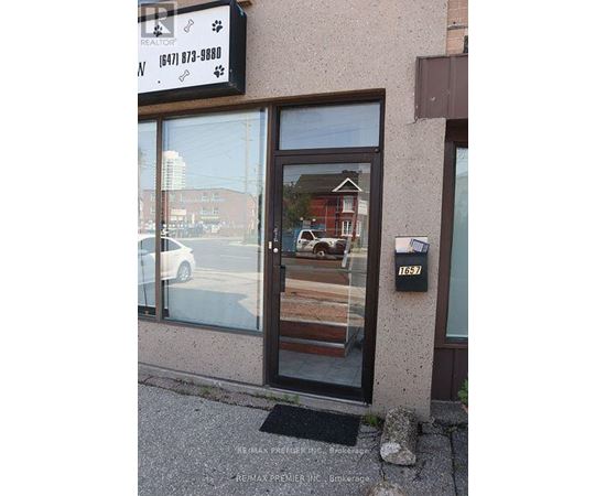 A building with a sign that says RE/MAX Premier.