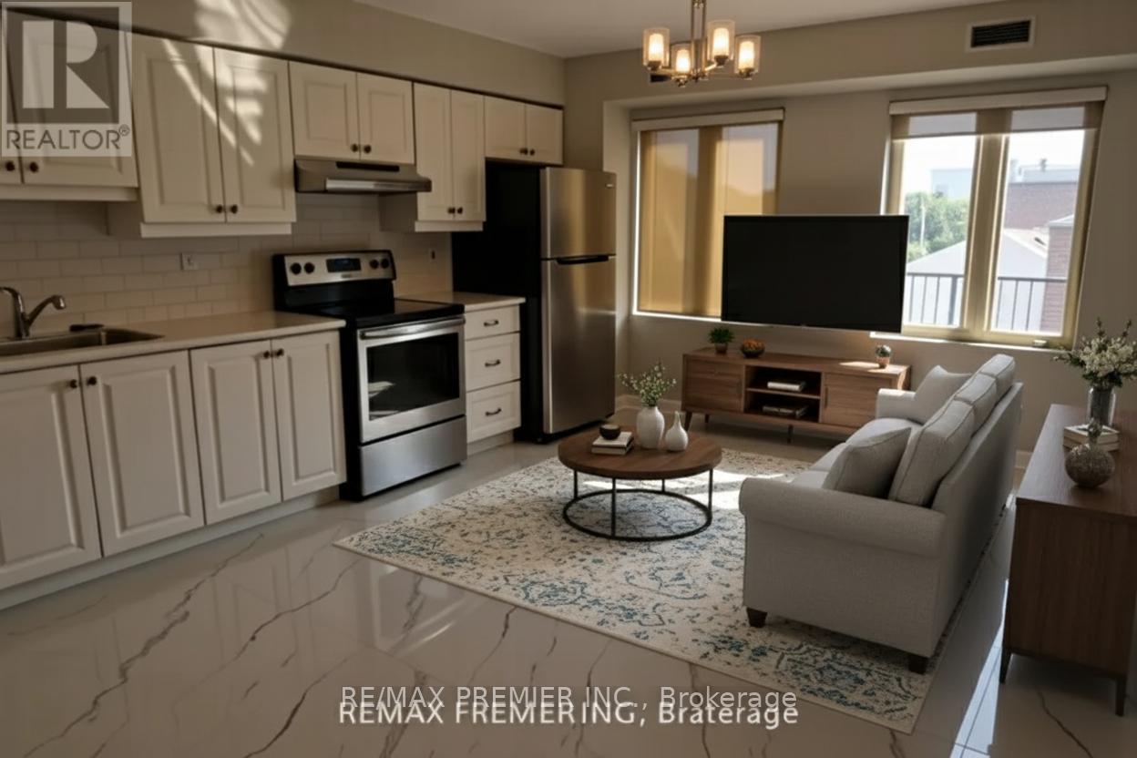 A well-lit kitchen with a refrigerator, oven, and sink.