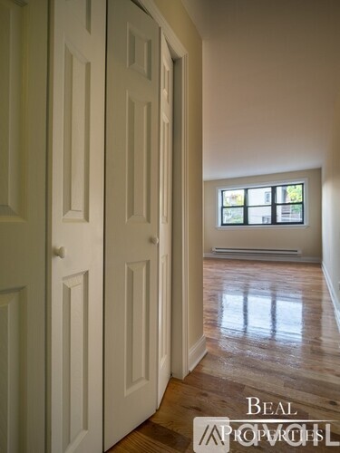 A room with a door and a window.