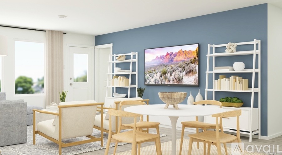 A modern dining room with a large painting on the wall and a white dining table set with chairs.