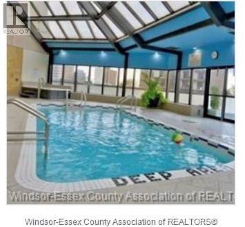 A pool with the words deep end written on the side.