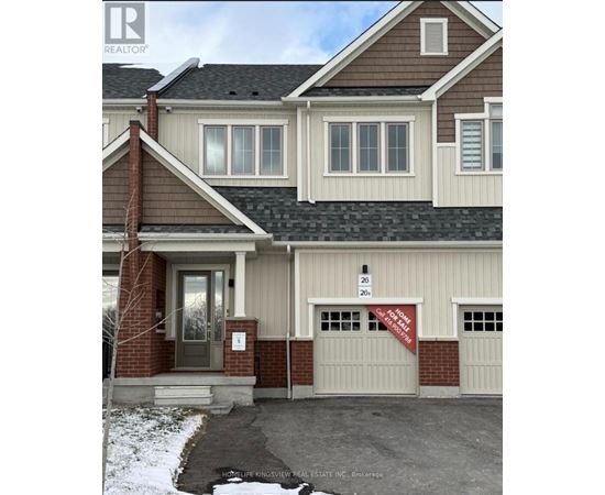 A house with a sign that says Pot of Gold Real Estate Inc. Brokerage.