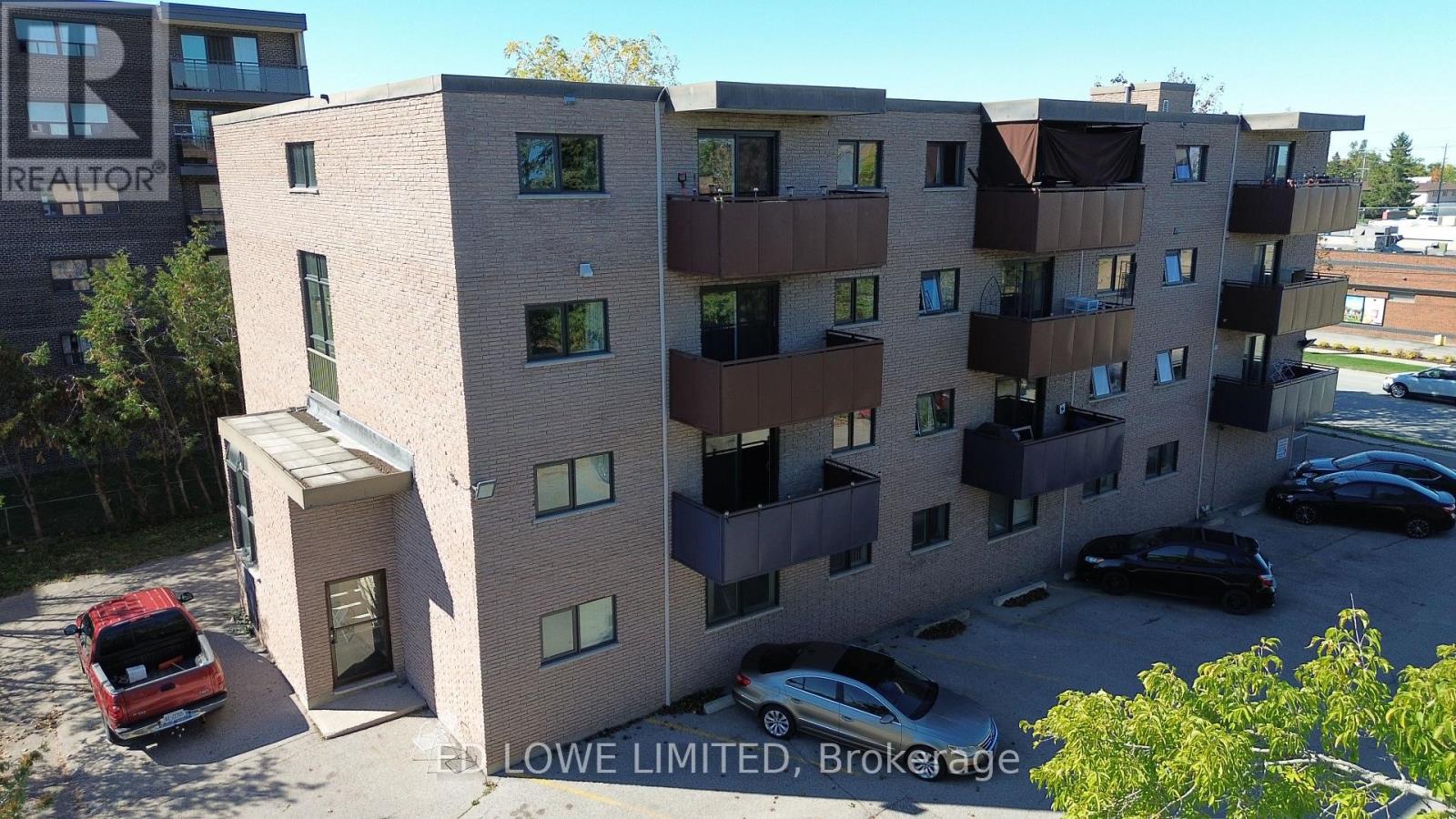 A building with the words LOWE LIMITED Brokerage on it.