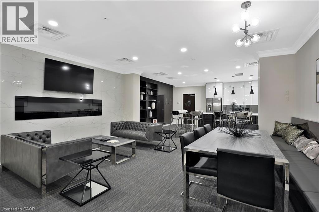 A modern living room with a black and white color scheme.
