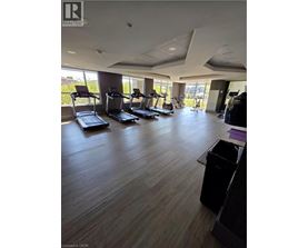 A gym with treadmills and exercise equipment.