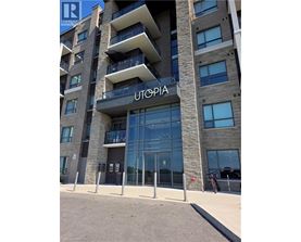The front of a building with the name UTOPIA on it.