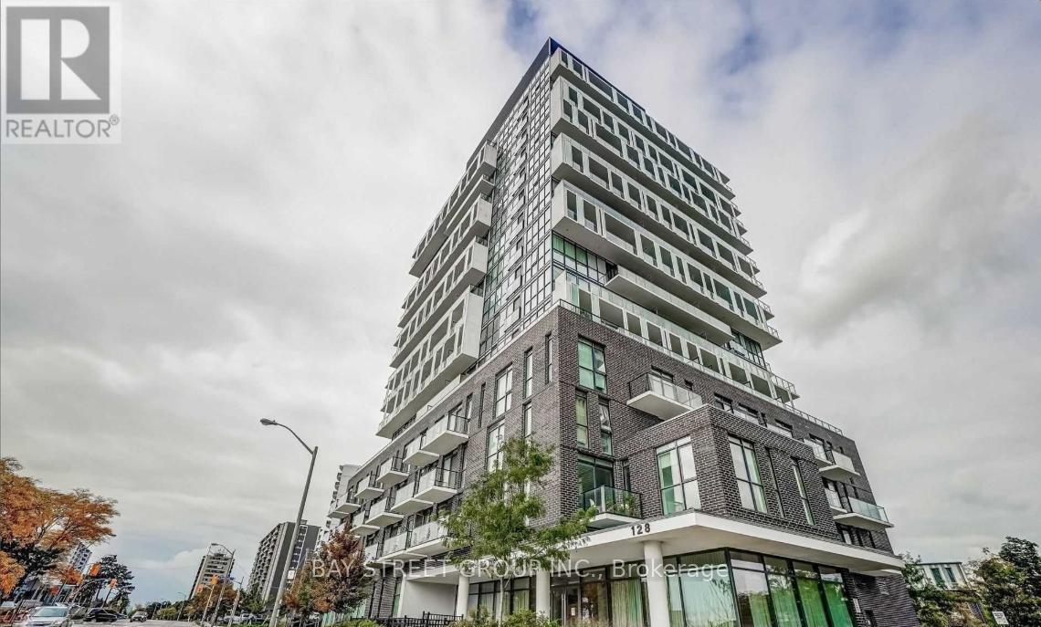 A tall residential building with a modern design is shown in the image.