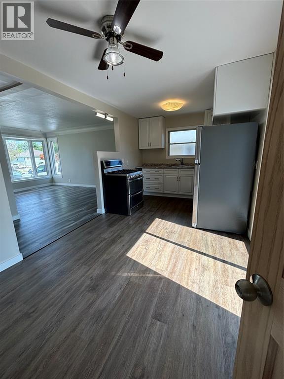 A realtor logo is on the top left corner of the image.