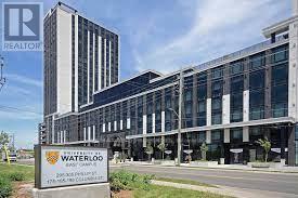 A large building with a sign that says Waterloo in front of it.