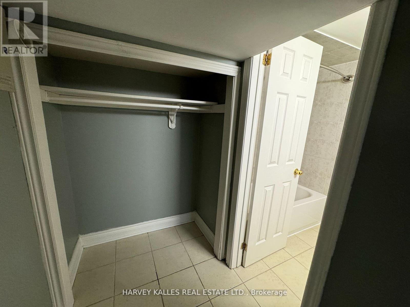 A small room with a door and a window.