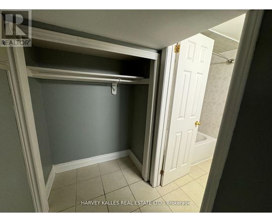 A small room with a door and a window.