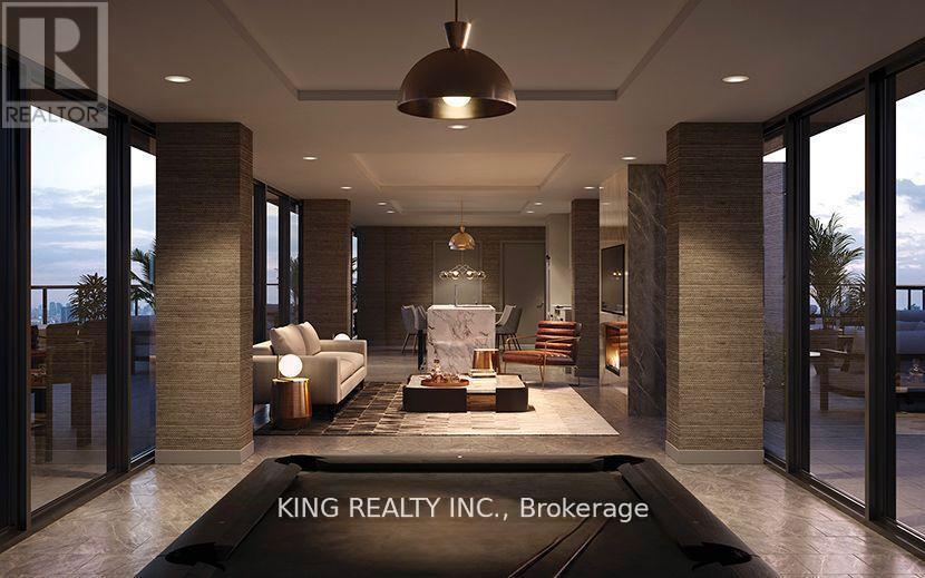 A modern living room with a large sofa and a coffee table.