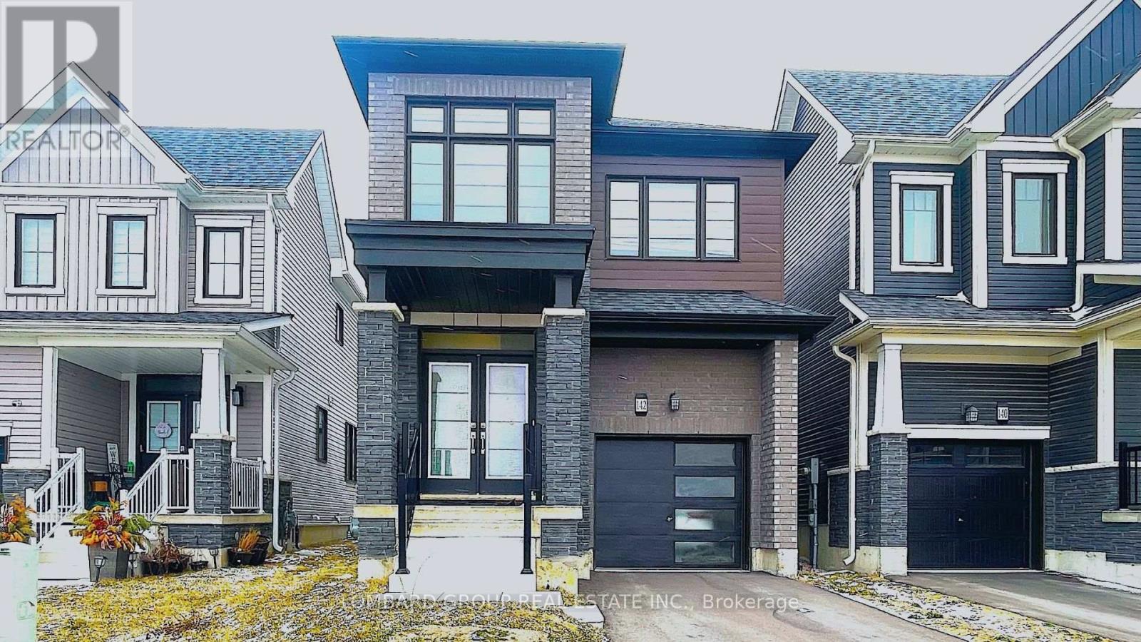 A row of houses with the first one having a REALTOR sign.