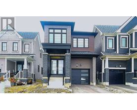 A row of houses with the first one having a REALTOR sign.