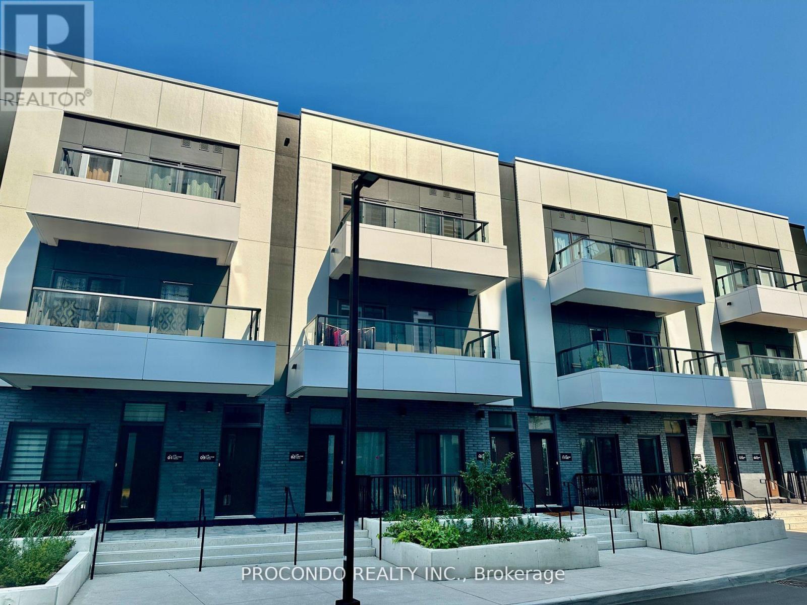 A building with balconies and doors is labeled with "PROCONDO REALTY INC. Brokerage".