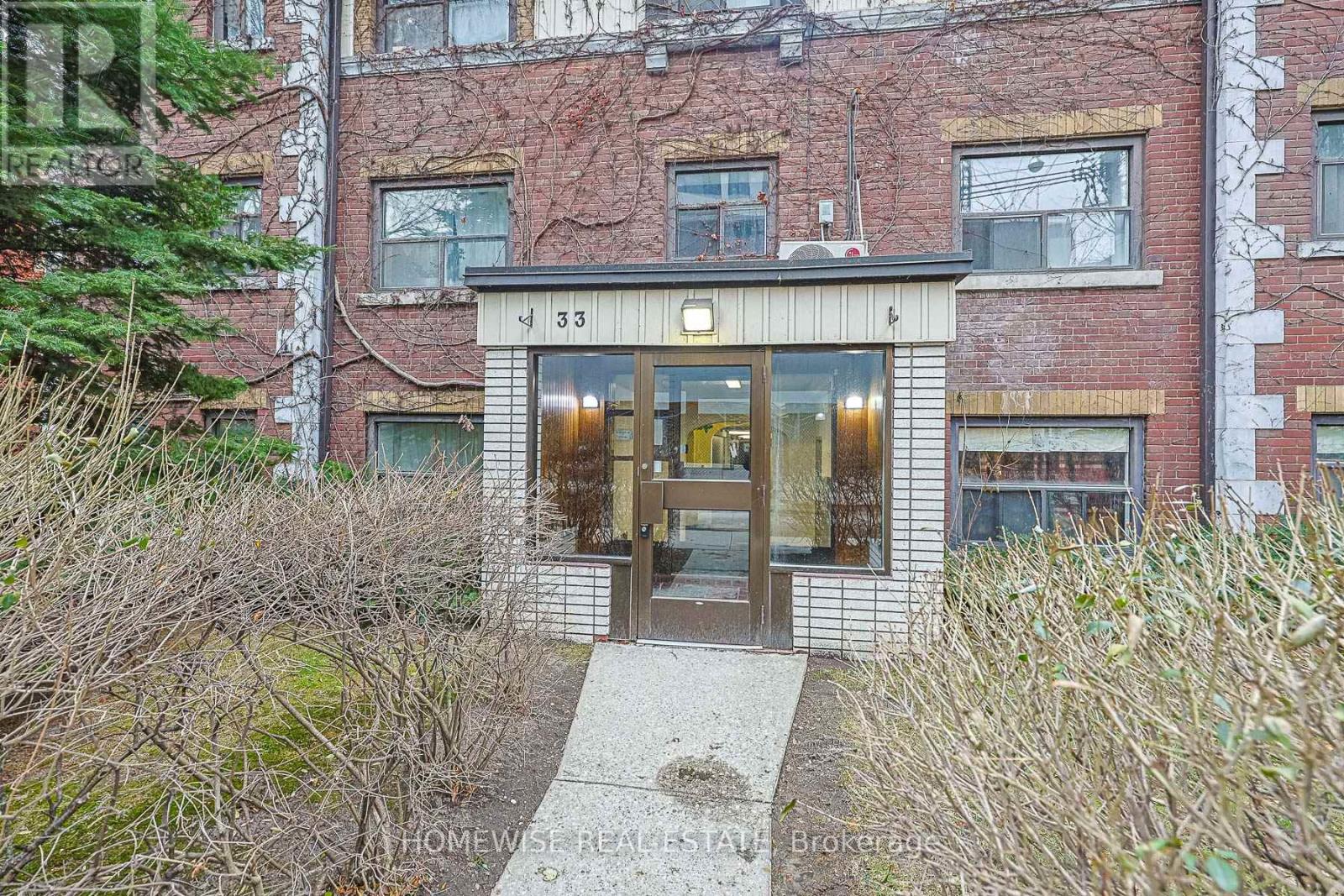 The image shows a building with the number 533 on it.