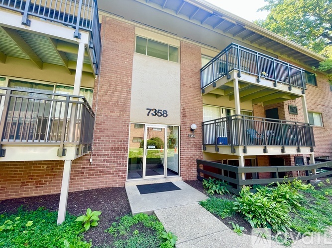 The image shows a building with the number 7358 on it.