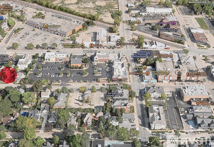 An aerial view of a city with streets and buildings.