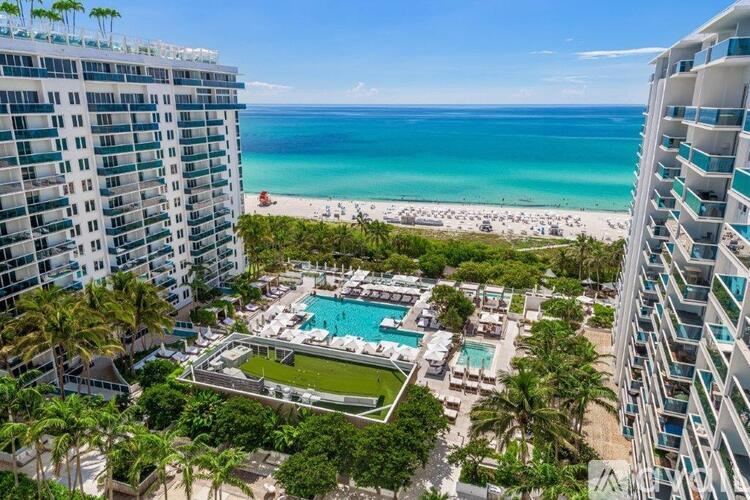 A view of a beach from a high rise building.