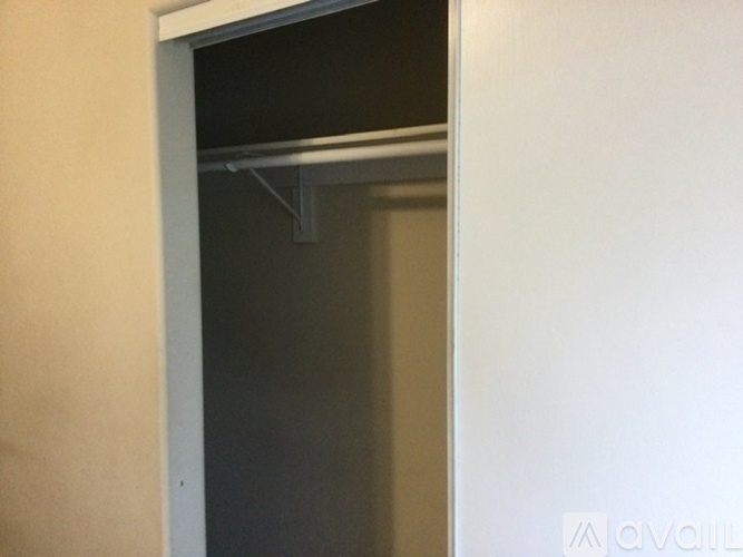 A white door with a glass window in the middle.