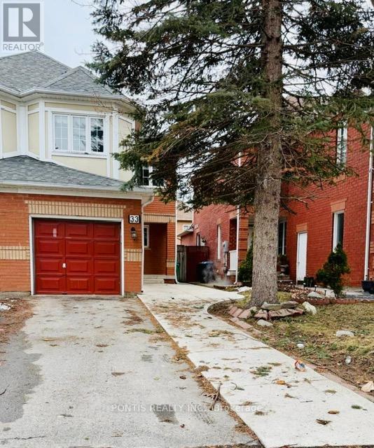 A red garage door is on the left side of the image.