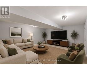 A living room with a couch, a coffee table, and a television.