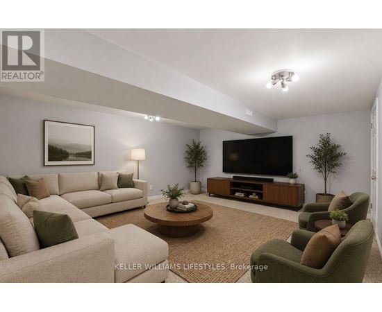 A living room with a couch, a coffee table, and a television.