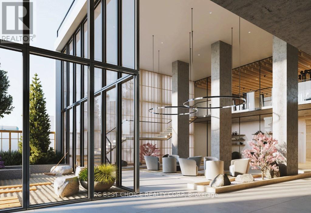 A modern interior space with a glass wall and hanging plants.