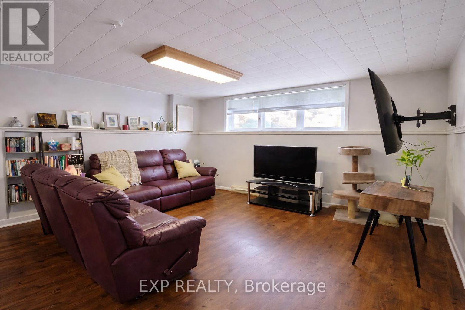 A kitchen with a table and chairs in the middle of the room.