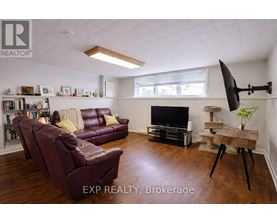 A kitchen with a table and chairs in the middle of the room.