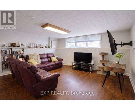 A kitchen with a table and chairs in the middle of the room.