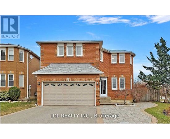 A house with a garage is for sale by JDL Realty Inc.