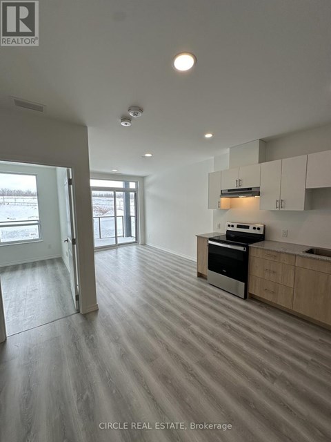 A kitchen with a stove top oven and a microwave.