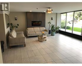 A living room with a fireplace and a couch.