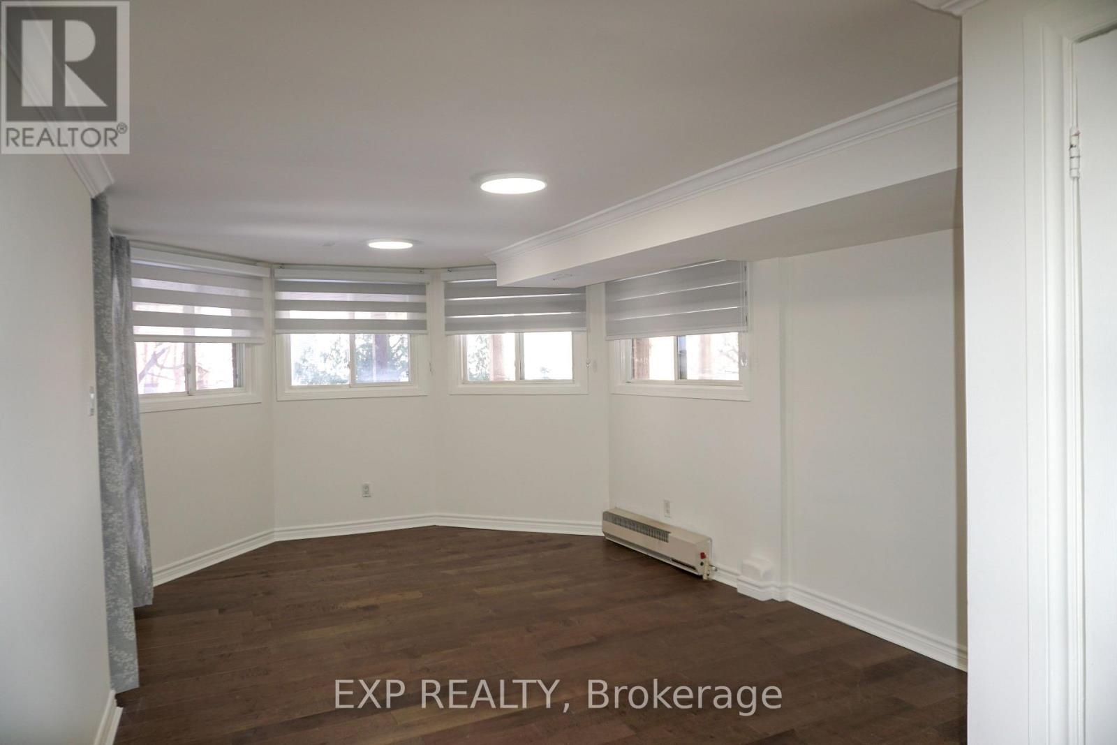A room with EXP REALTY, Brokerage watermark on the floor.