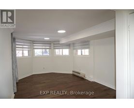 A room with EXP REALTY, Brokerage watermark on the floor.