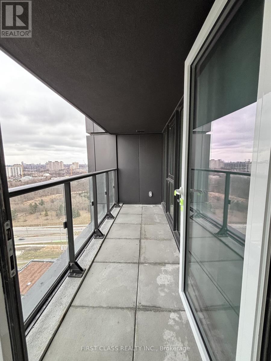 A balcony with a view of the cityscape.