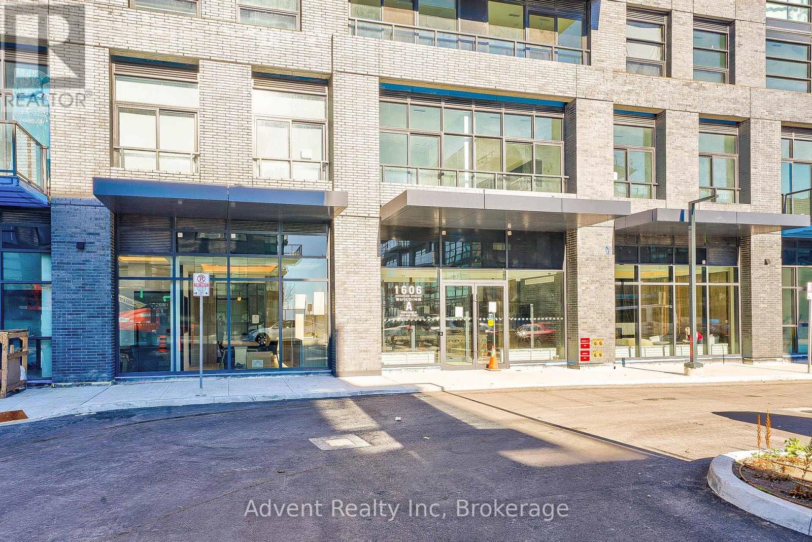 A building with the words "Advent Realty Inc Brokerage" written on the bottom.