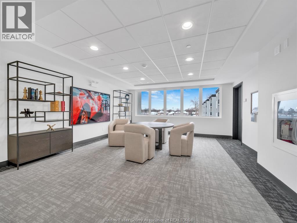 A spacious office room with a large table and chairs.