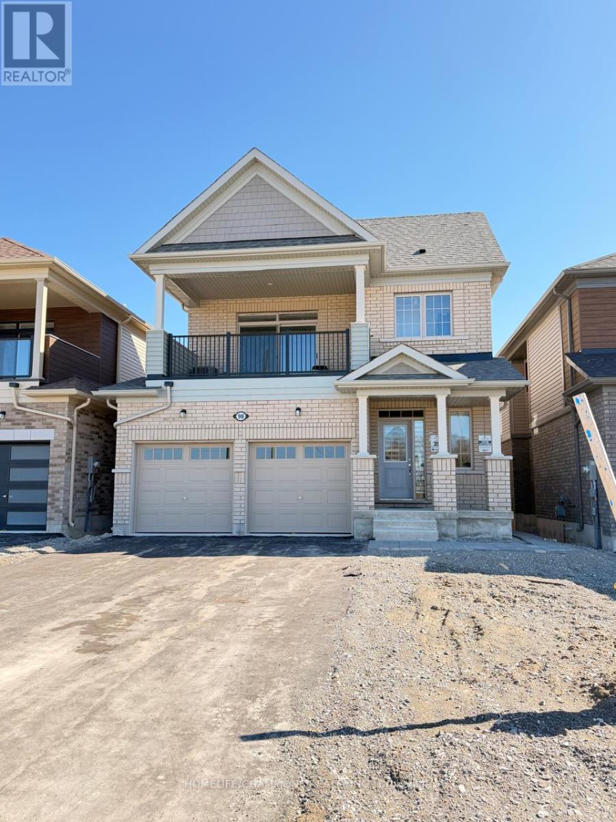 A real estate image of a house with a garage.