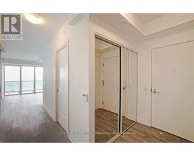 A realtor photo of a bedroom with a sliding door.