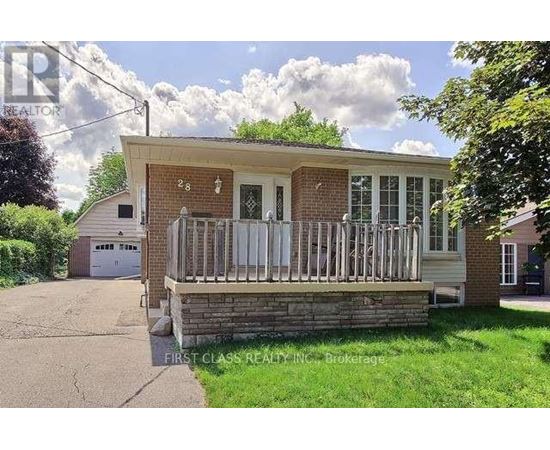 A small house with a porch and a garage.