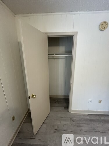 A room with a door and a window.