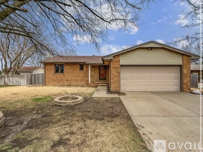 A house with a driveway and a garage door.