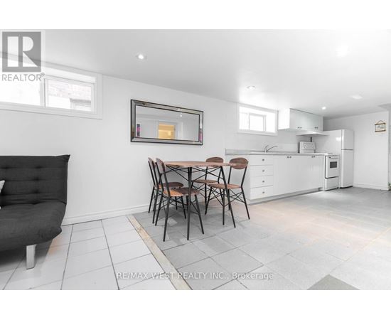 A dining area with a table and chairs is shown in the image.