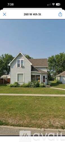 A house at 260 W 4th St is shown in the image.