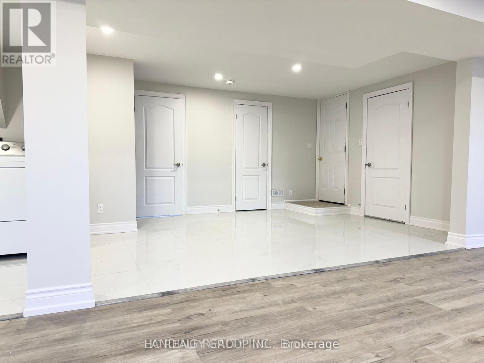 A real estate office is advertising a property for sale.
