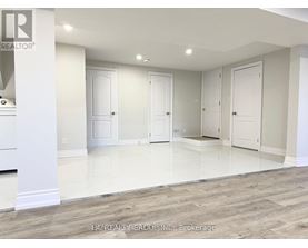 A real estate office is advertising a property for sale.