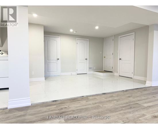 A real estate office is advertising a property for sale.