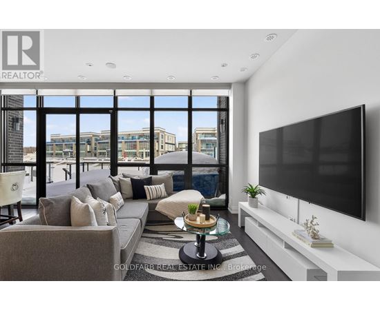A modern living room with a large window overlooking the city.